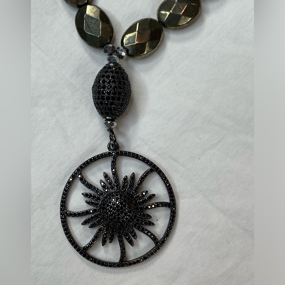 Unique Sunburst Pendent necklace Black and Silver tone‎ beads